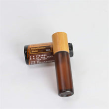 Load image into Gallery viewer, 10 ml - Roll on de luxe Bamboo ambre dépoli bille métallique (1 pièce) - Essentials 4 oils
